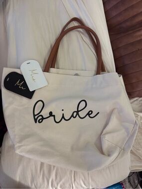 Bride Canvas Tote Bag with Brown Handles and luggage tags